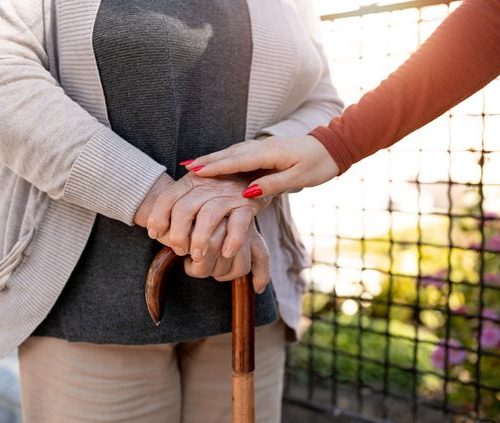 person-helping-their-elder-neighbour-1